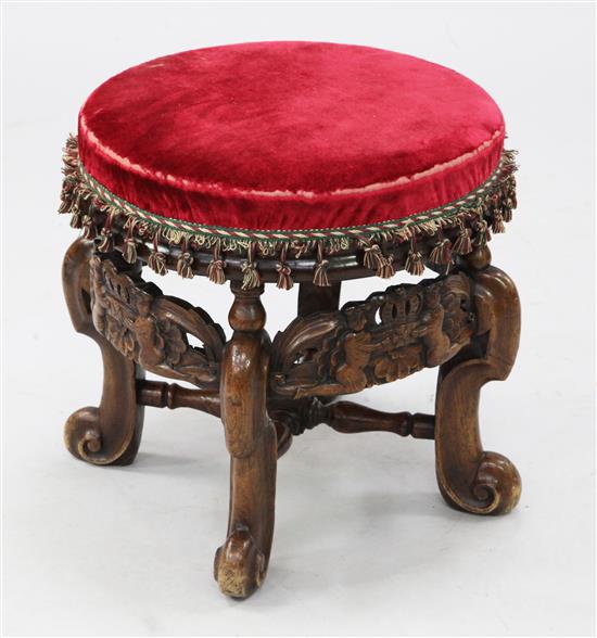 A Carolean style carved oak dressing stool, H.1ft 4in.